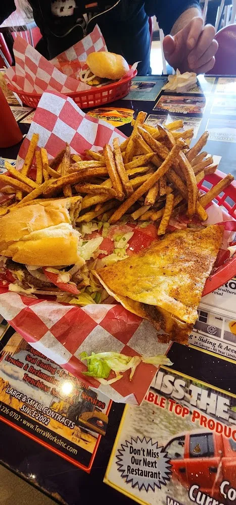 Half a Baltimore Fried Cheese Burger Sub and 1 4 of a Brazilian Beef and Green Chili Quesadilla